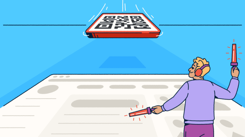 A person waving airport marshalling wands on a landing strip. They are guiding a QR Code to land.