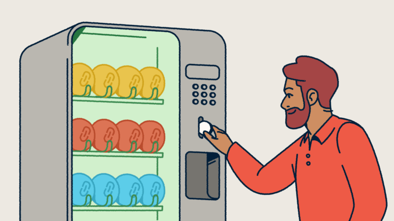 A man putting a coin into a vending machine full of various link shorteners.