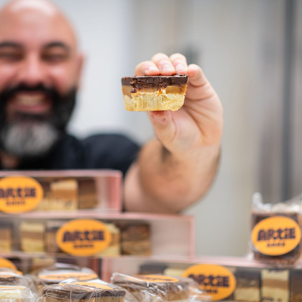 Artie holding up one of his famous bars.